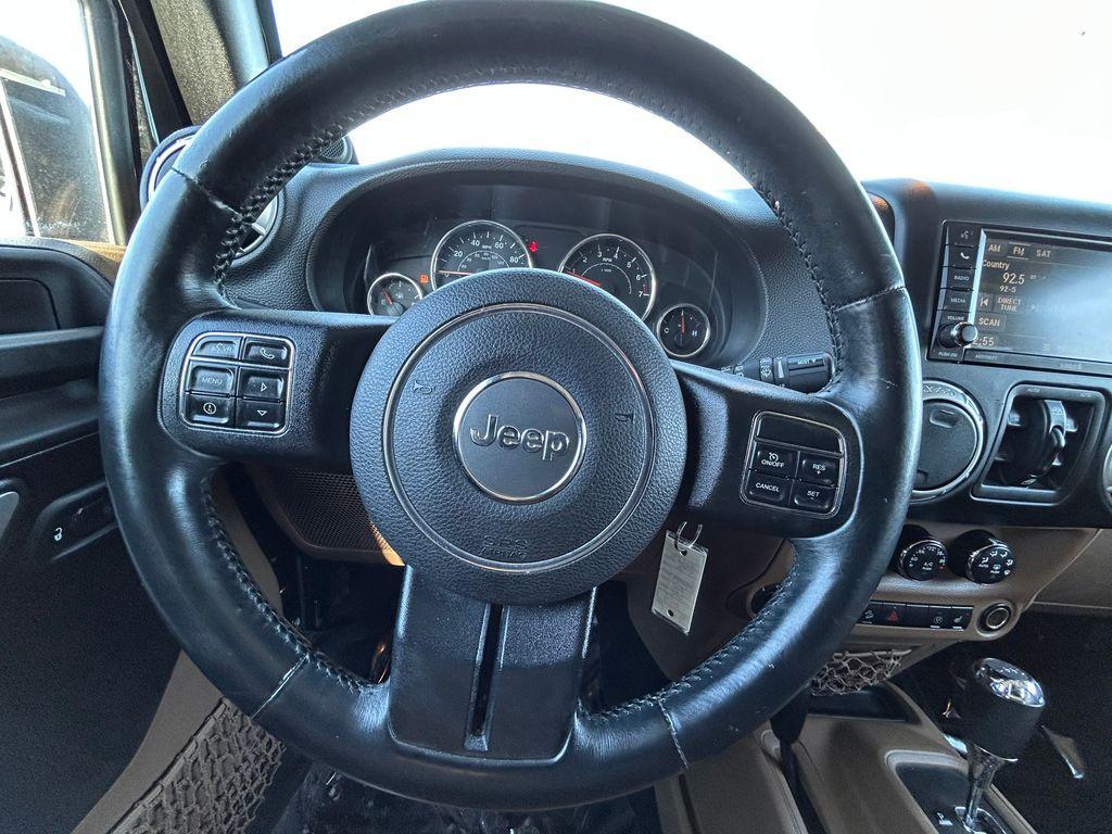 used 2013 Jeep Wrangler Unlimited car, priced at $13,995