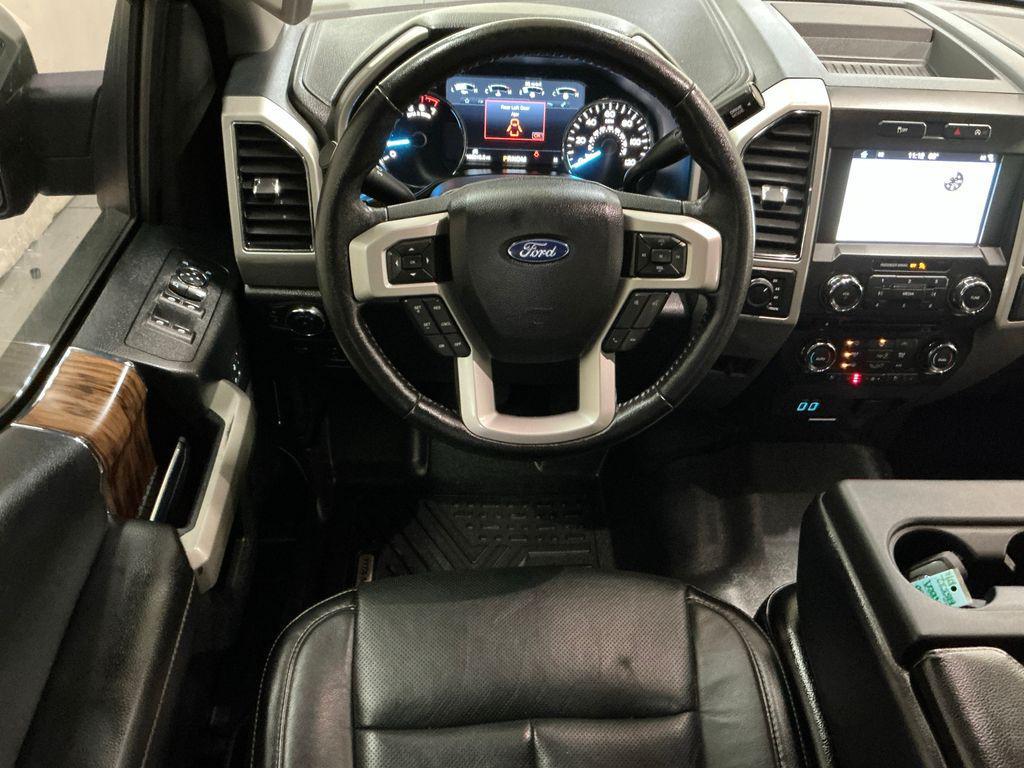 used 2018 Ford F-150 car, priced at $26,464