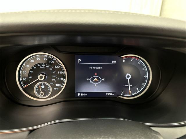 used 2023 Genesis G70 car, priced at $30,642