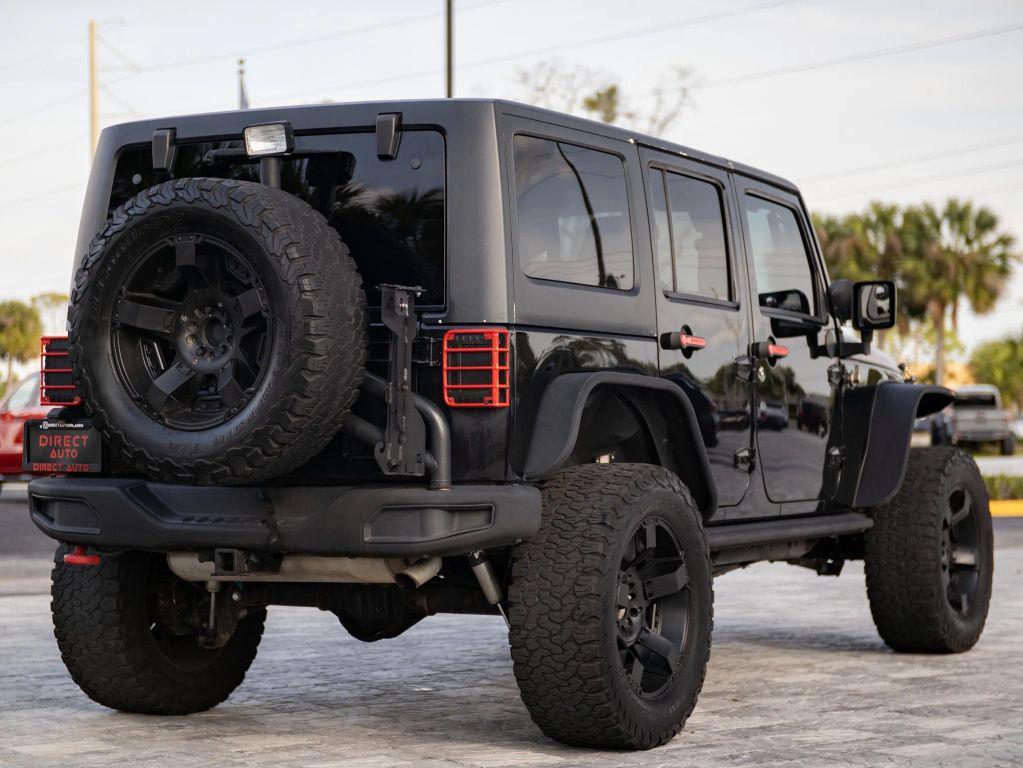 used 2015 Jeep Wrangler Unlimited car, priced at $19,192