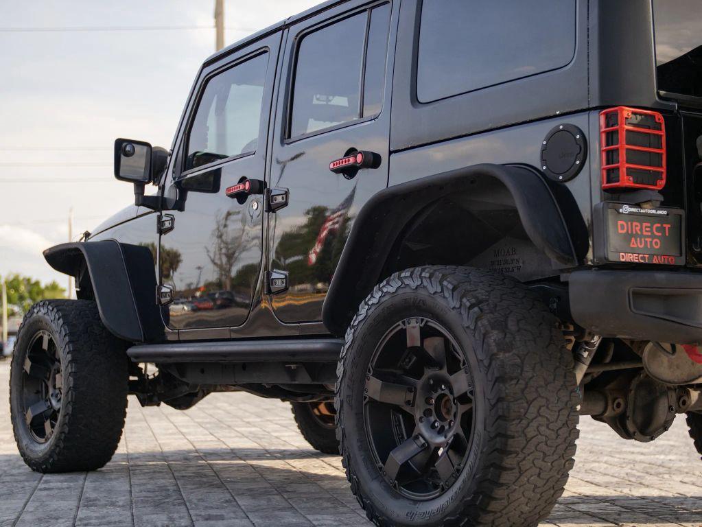used 2015 Jeep Wrangler Unlimited car, priced at $19,192