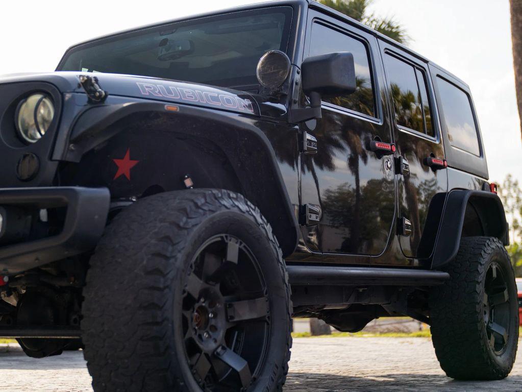 used 2015 Jeep Wrangler Unlimited car, priced at $19,192