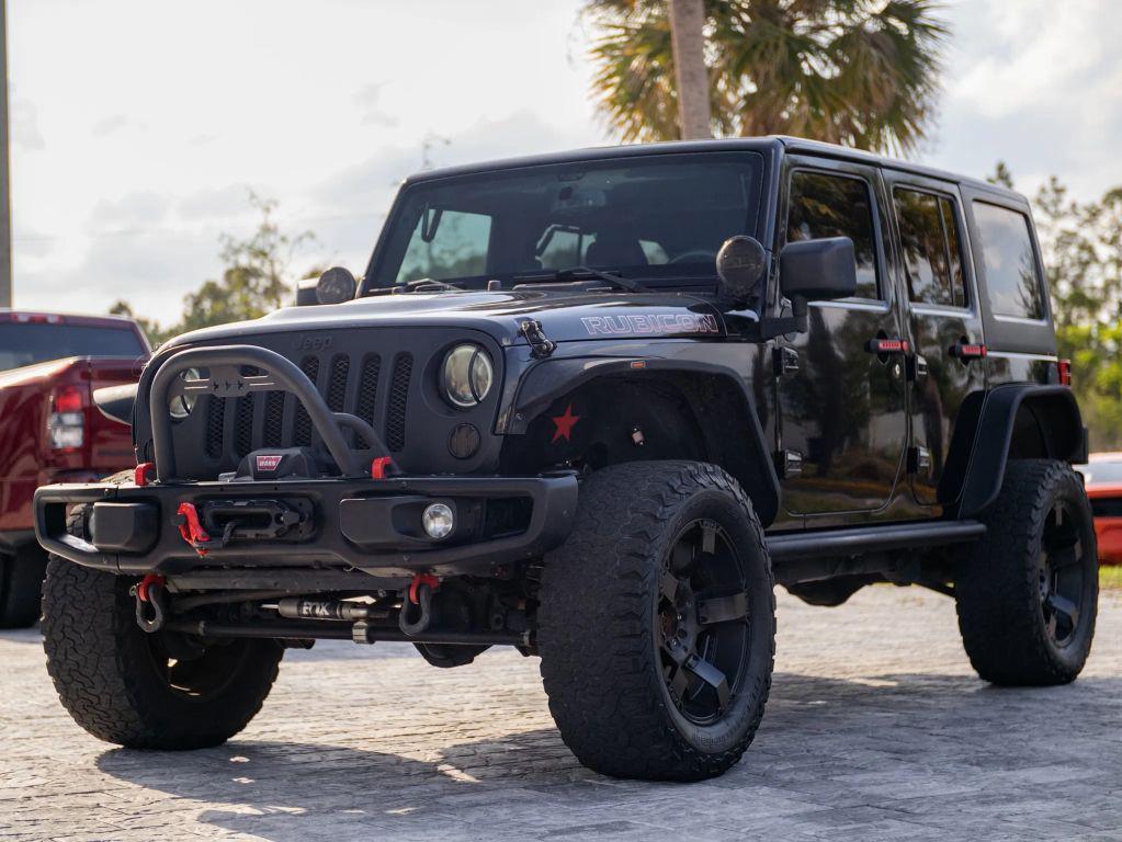 used 2015 Jeep Wrangler Unlimited car, priced at $19,192