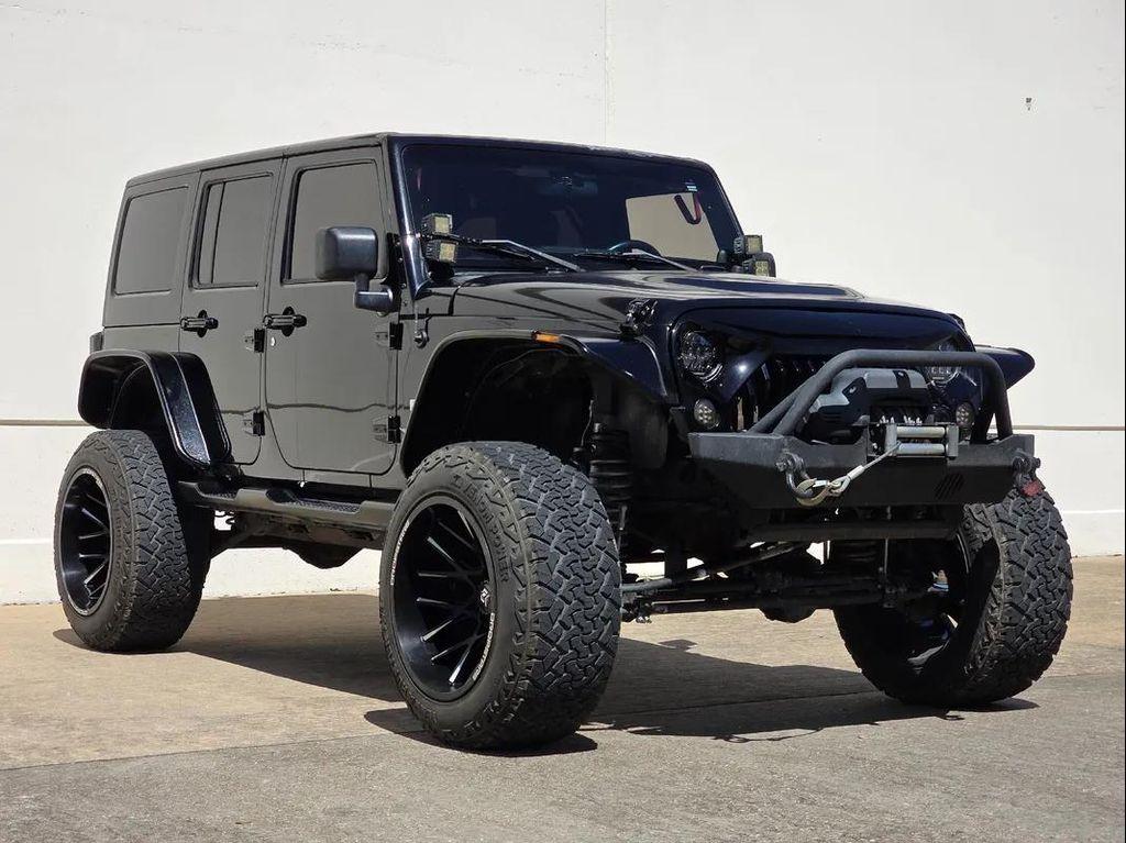 used 2011 Jeep Wrangler Unlimited car, priced at $14,989