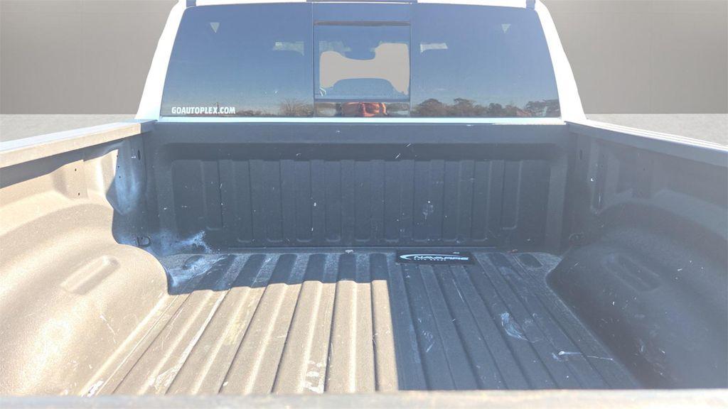 used 2021 Ram 1500 car, priced at $26,025