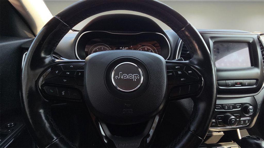 used 2021 Jeep Cherokee car, priced at $14,041