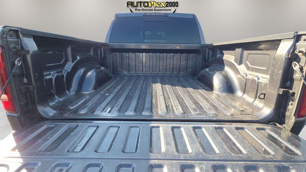 used 2019 Ram 1500 car, priced at $29,187