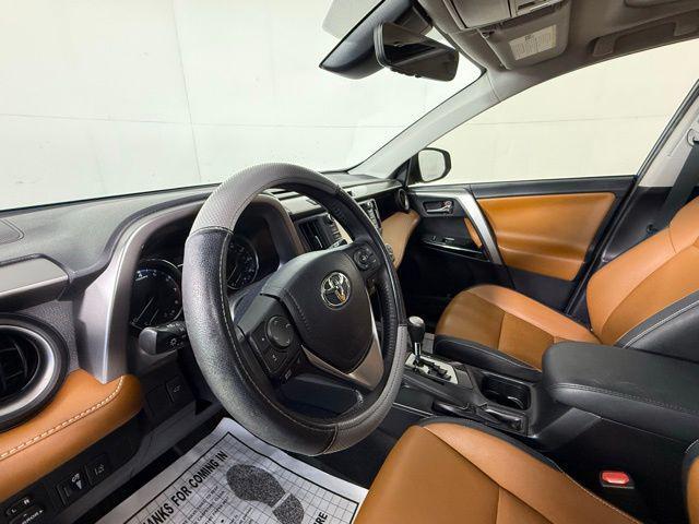 used 2016 Toyota RAV4 car, priced at $17,990