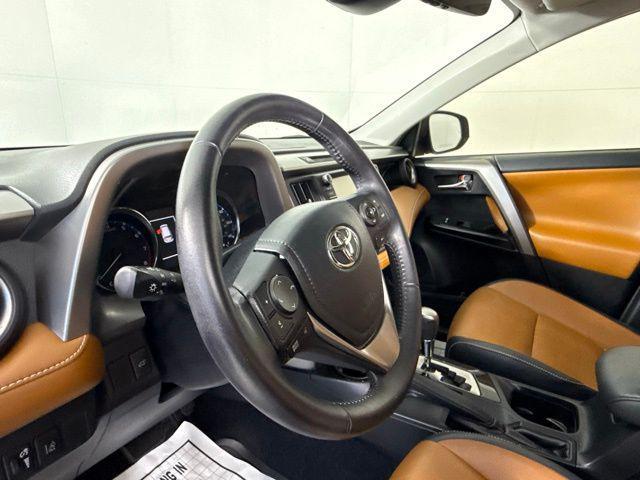 used 2016 Toyota RAV4 car, priced at $17,990