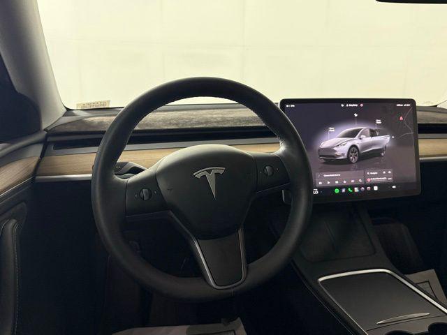used 2024 Tesla Model Y car, priced at $38,018