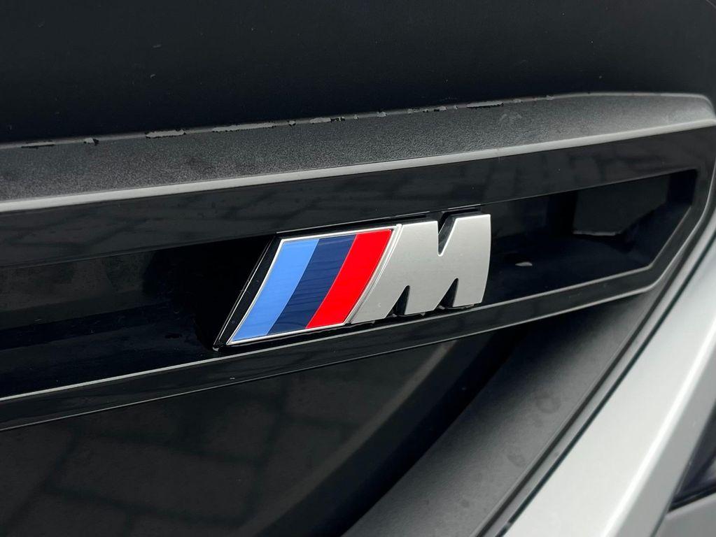 used 2024 BMW i5 car, priced at $59,500