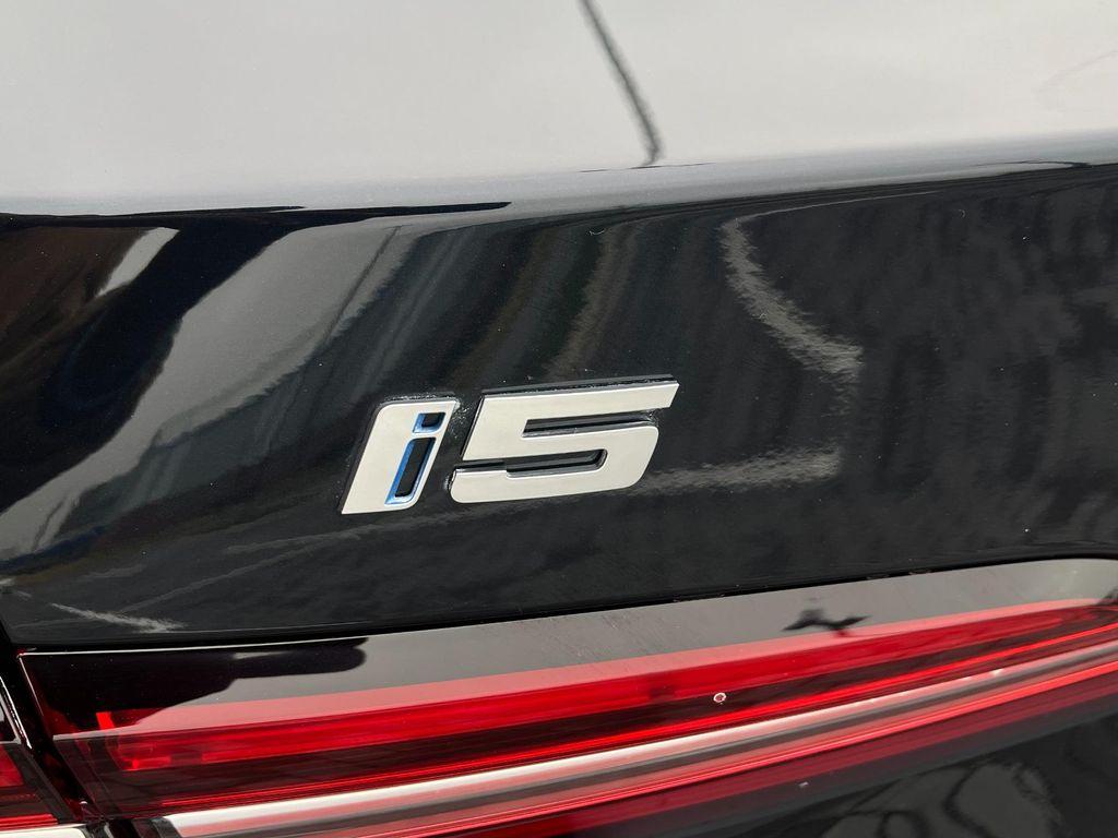 used 2024 BMW i5 car, priced at $59,500