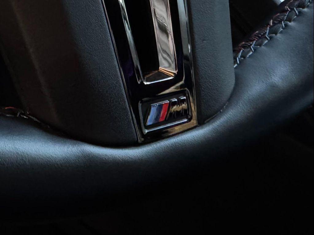 used 2024 BMW XM car, priced at $95,950