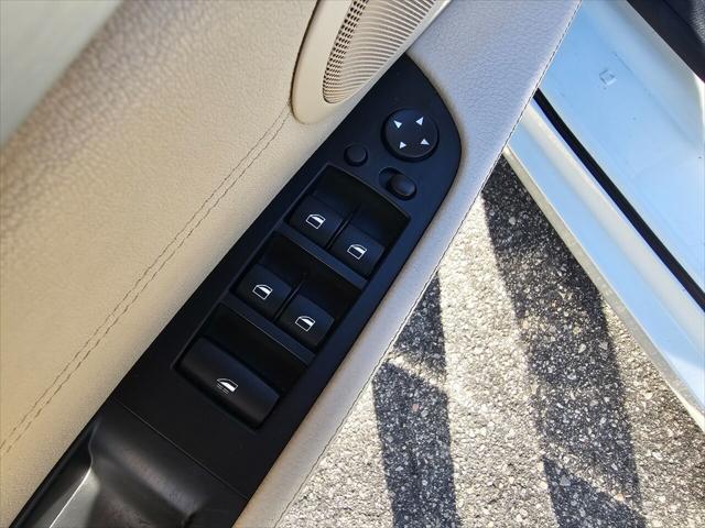 used 2014 BMW Z4 car, priced at $14,999