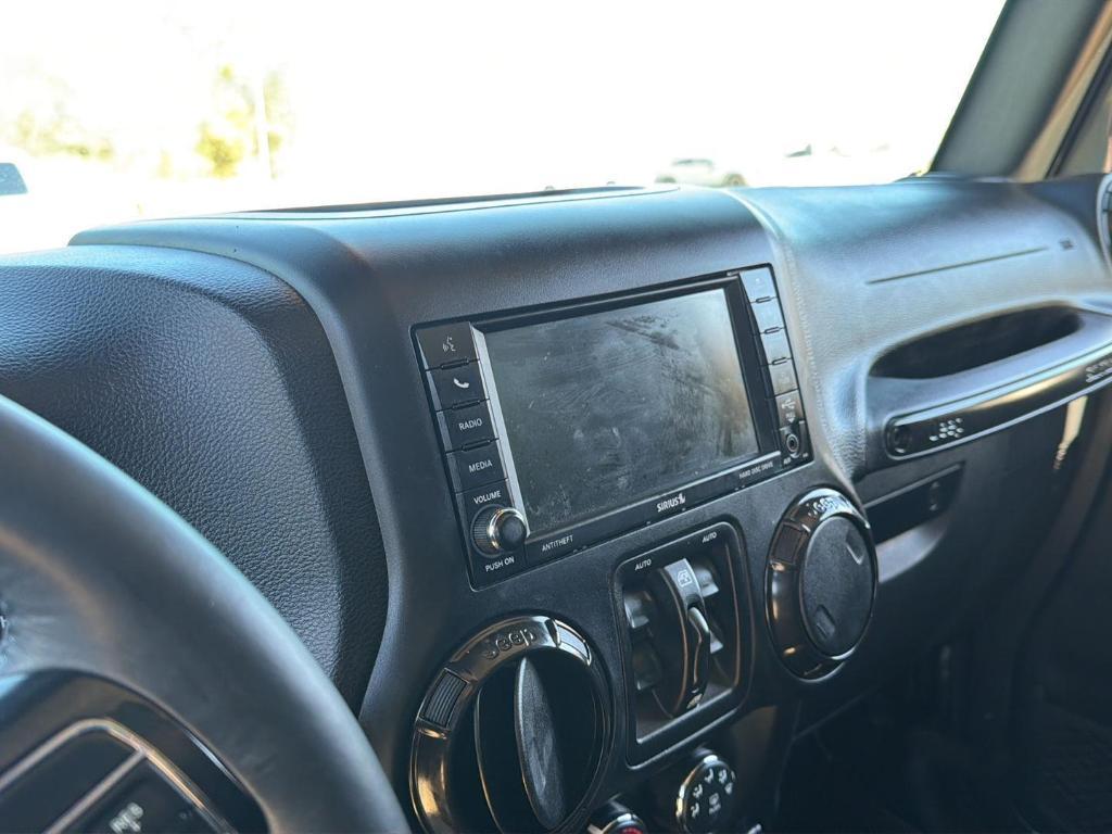 used 2017 Jeep Wrangler Unlimited car, priced at $22,333