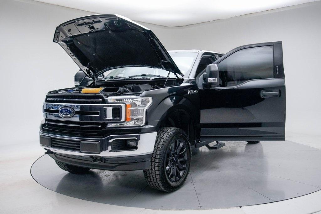 used 2018 Ford F-150 car, priced at $14,850