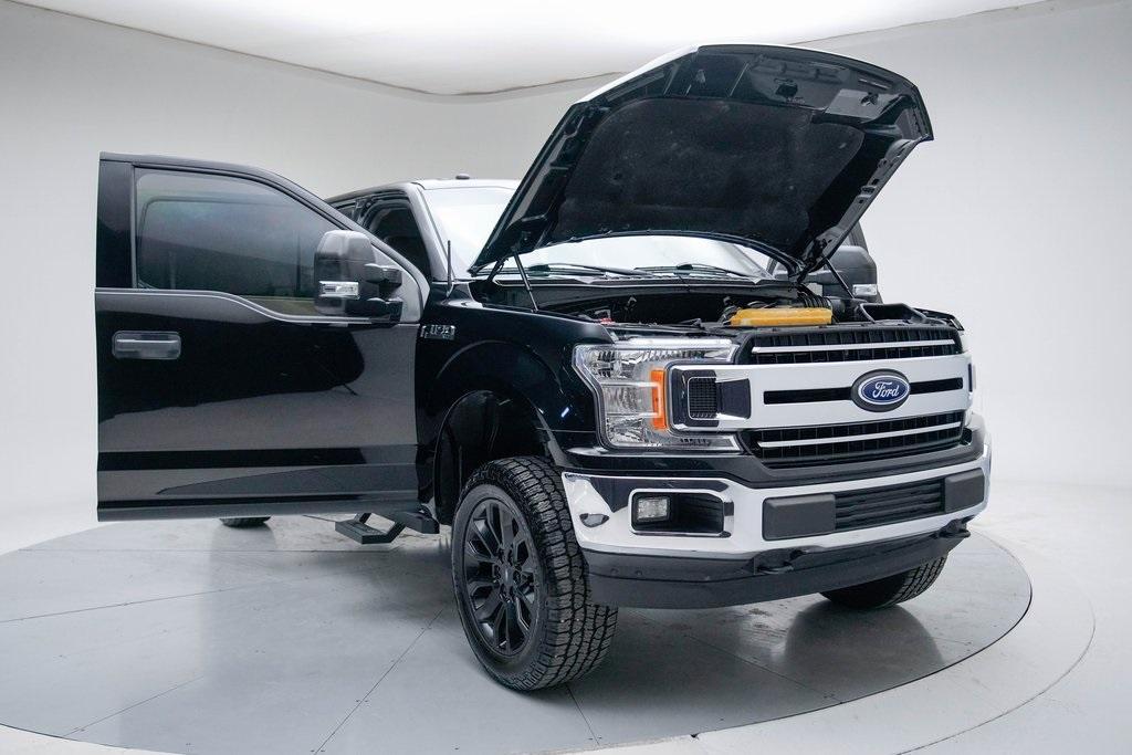 used 2018 Ford F-150 car, priced at $14,850