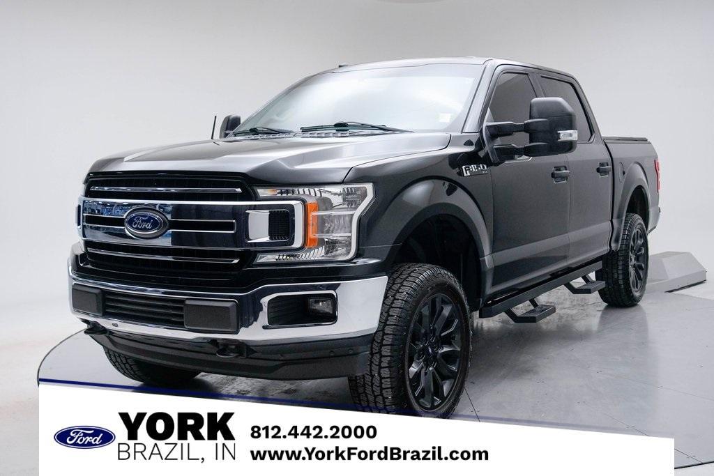 used 2018 Ford F-150 car, priced at $14,850