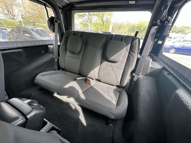 used 2023 Jeep Wrangler car, priced at $26,842