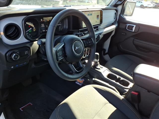 used 2024 Jeep Wrangler car, priced at $33,523