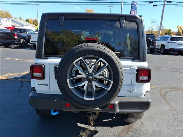 used 2024 Jeep Wrangler car, priced at $33,523