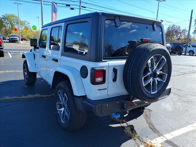 used 2024 Jeep Wrangler car, priced at $33,523