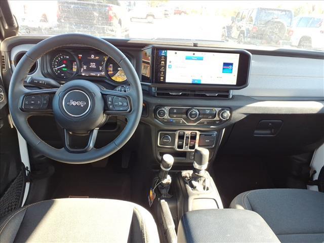 used 2024 Jeep Wrangler car, priced at $33,523