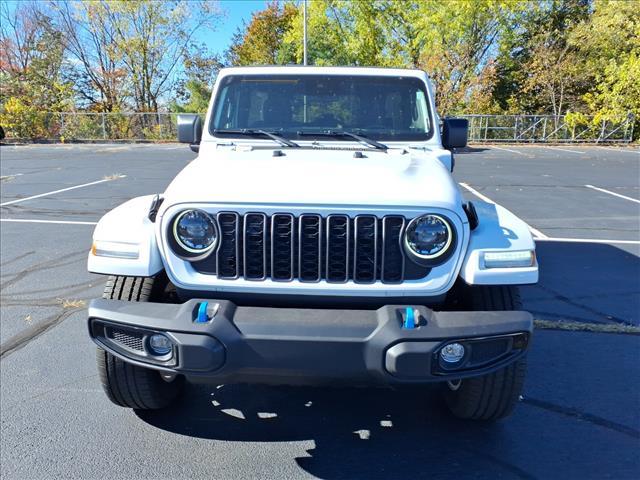 used 2024 Jeep Wrangler car, priced at $33,523