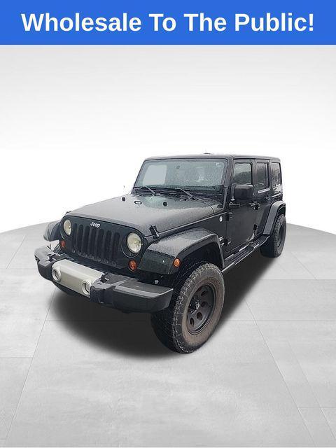 used 2011 Jeep Wrangler Unlimited car, priced at $13,206