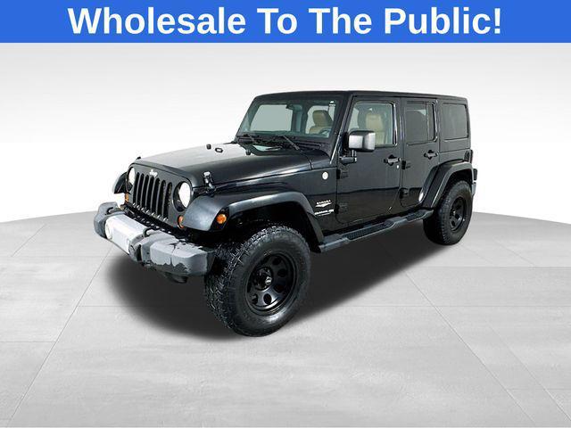 used 2011 Jeep Wrangler Unlimited car, priced at $13,168