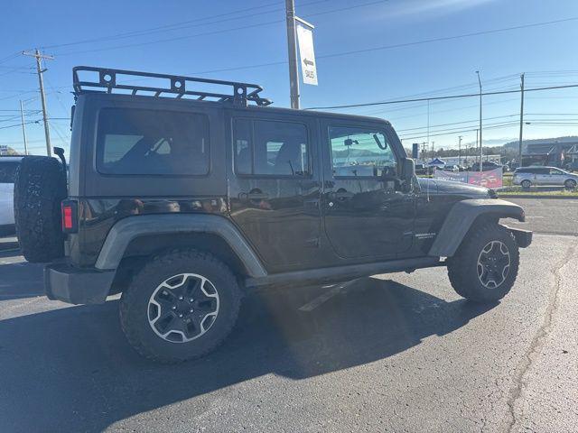 used 2012 Jeep Wrangler Unlimited car, priced at $15,619