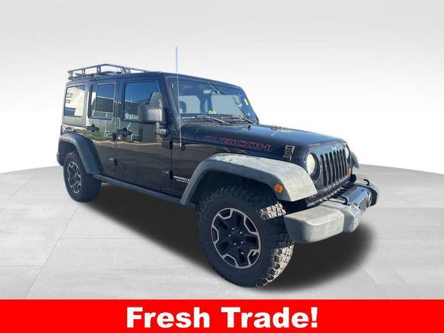 used 2012 Jeep Wrangler Unlimited car, priced at $15,619