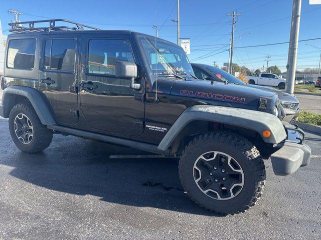 used 2012 Jeep Wrangler Unlimited car, priced at $15,619