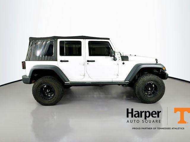 used 2015 Jeep Wrangler Unlimited car, priced at $15,596