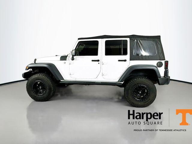 used 2015 Jeep Wrangler Unlimited car, priced at $15,596