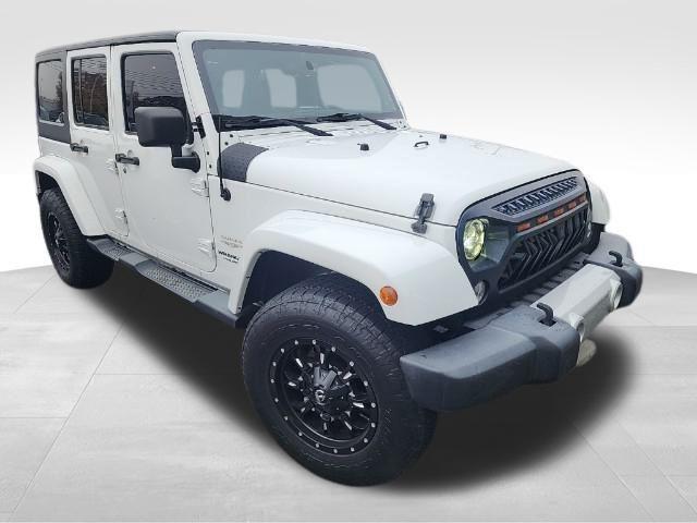 used 2014 Jeep Wrangler Unlimited car, priced at $13,900