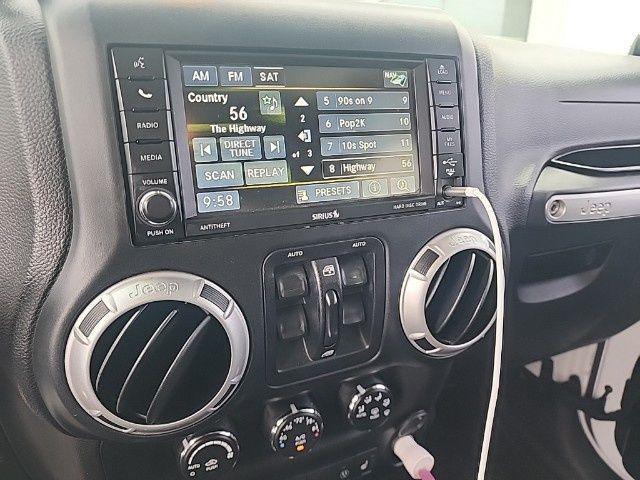 used 2014 Jeep Wrangler Unlimited car, priced at $13,895