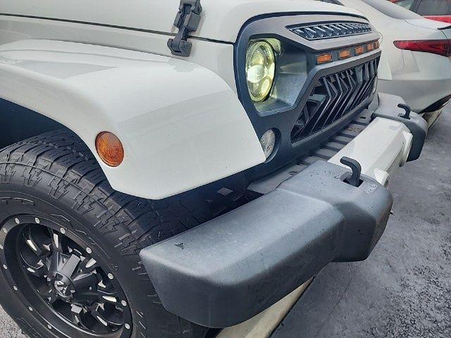 used 2014 Jeep Wrangler Unlimited car, priced at $13,895