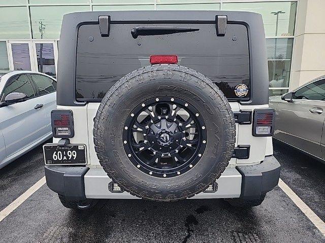 used 2014 Jeep Wrangler Unlimited car, priced at $13,895