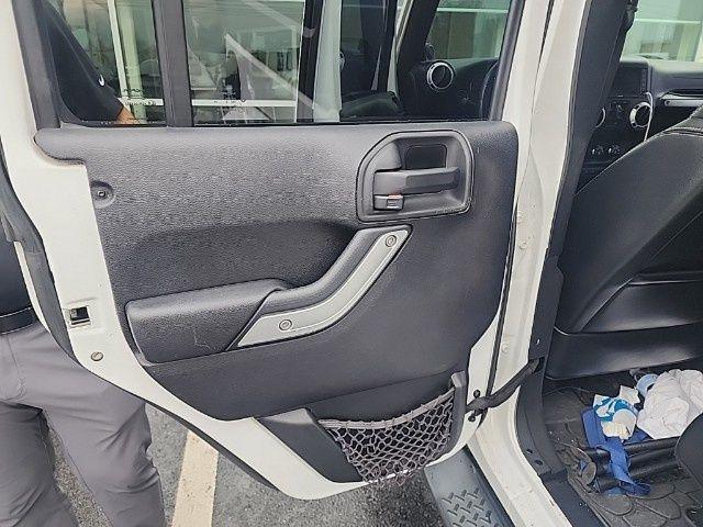 used 2014 Jeep Wrangler Unlimited car, priced at $13,895