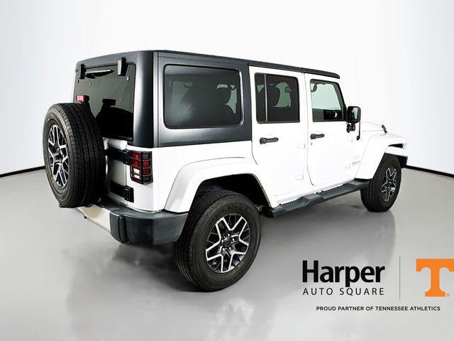 used 2015 Jeep Wrangler Unlimited car, priced at $17,233