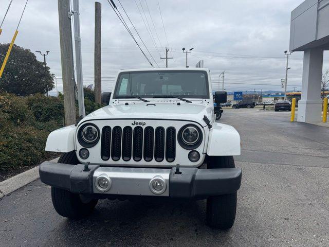 used 2015 Jeep Wrangler Unlimited car, priced at $17,868