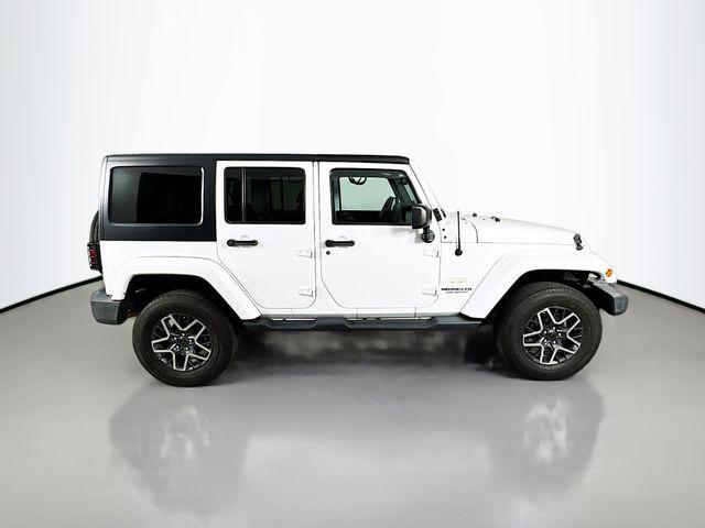 used 2015 Jeep Wrangler Unlimited car, priced at $16,460