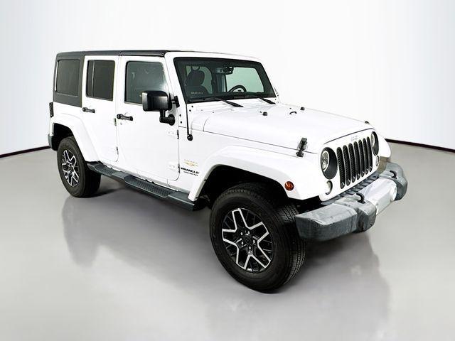 used 2015 Jeep Wrangler Unlimited car, priced at $16,460