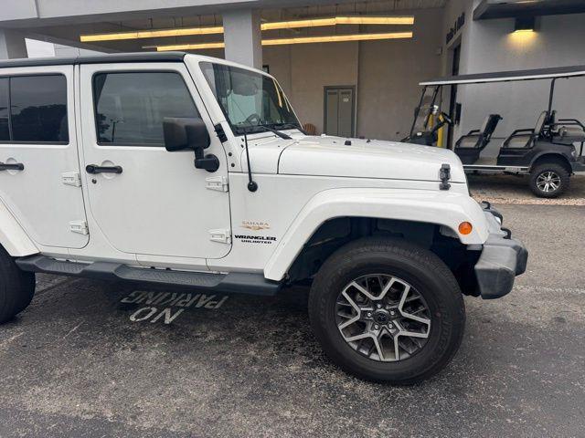 used 2015 Jeep Wrangler Unlimited car, priced at $17,868