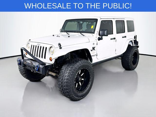 used 2013 Jeep Wrangler Unlimited car, priced at $12,495
