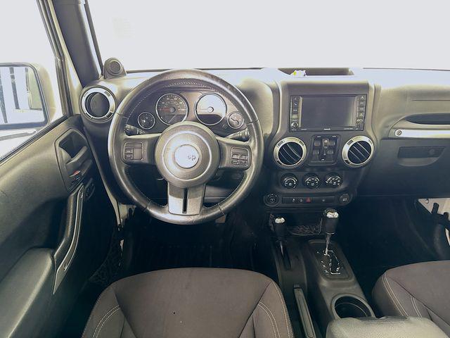 used 2013 Jeep Wrangler Unlimited car, priced at $12,495