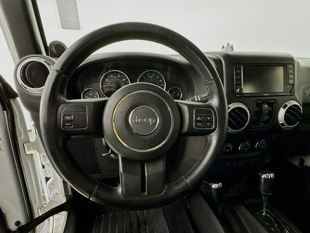 used 2013 Jeep Wrangler Unlimited car, priced at $12,495