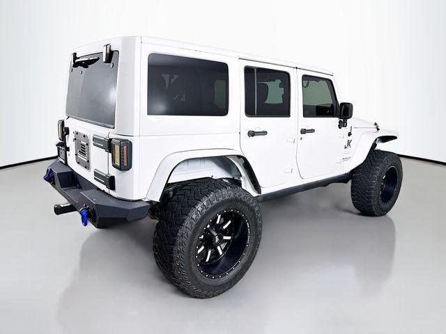 used 2013 Jeep Wrangler Unlimited car, priced at $12,495