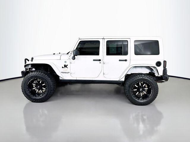used 2013 Jeep Wrangler Unlimited car, priced at $12,495